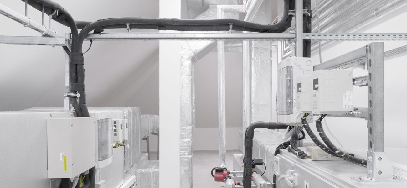 Mechanical Room with Insulated Pipes and Ductwork Mechanical Room with Insulated Pipes and Ductwork
